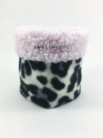 Gray Snow Leopard Swagsnood - Product Front View. Pink sherpa rolled up 1/3 of the snood and 2/3 with gray snow leopard print fleece