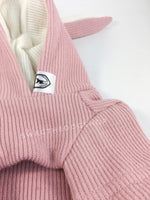 Pink Bunny Hoodie - Close Up of Label View. Pink Bunny Hoodie with Pom Pom Tail