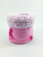 Pink Unicorn Swagsnood - Product Front View. Pink sherpa rolled up 1/3 of the snood and 2/3 with pink unicorn print fleece