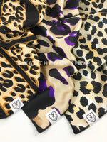 Take an advantage of 3 for $30 deal. 3 Beige color theme Swagdana Scarves displayed. 1-Leopard Camel. 2-Fierce Beige with Purple. 3-Fierce Beige with Yellow. Dog Bandana. Dog Scarf