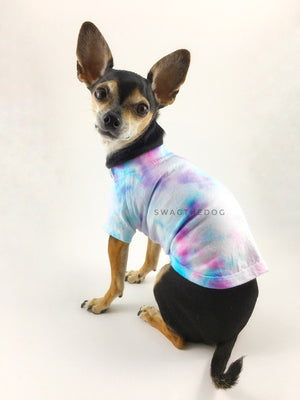 Swagadelic Unicorn Tie Dye Tee - Cute Chihuahua named Hugo in sitting position with his back towards the camera and looking back, wearing the hand tie-dyed tee with Pink and Sky Blue
