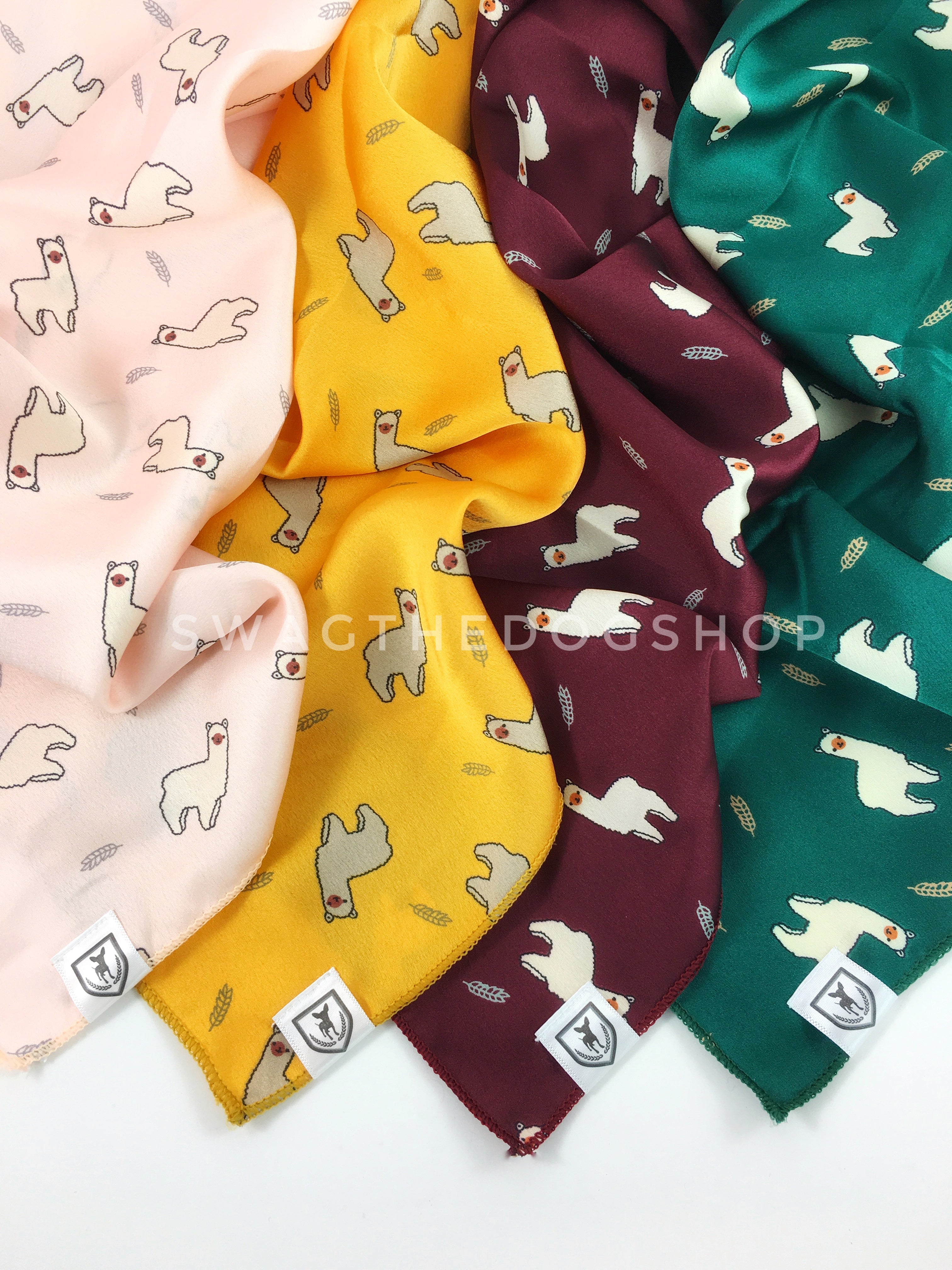 Take an advantage of 3 for $30 deal. 4 Lorenzo Llama Print Theme Swagdana Scarves displayed. 1-Lorenzo Llama Pink. 2-Lorenzo Llama Yellow. 3-Lorenzo Llama Burgundy. 4-Lorenzo Llama Green. Dog Bandana. Dog Scarf