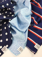 Take an advantage of 3 for $30 deal. 3 Blue Color Theme Swagdana Scarves displayed. 1-Polka Dot Navy. 2-Polka Itty Bitty Powder Blue. 3-Afternoon in Paris. Dog Bandana. Dog Scarf