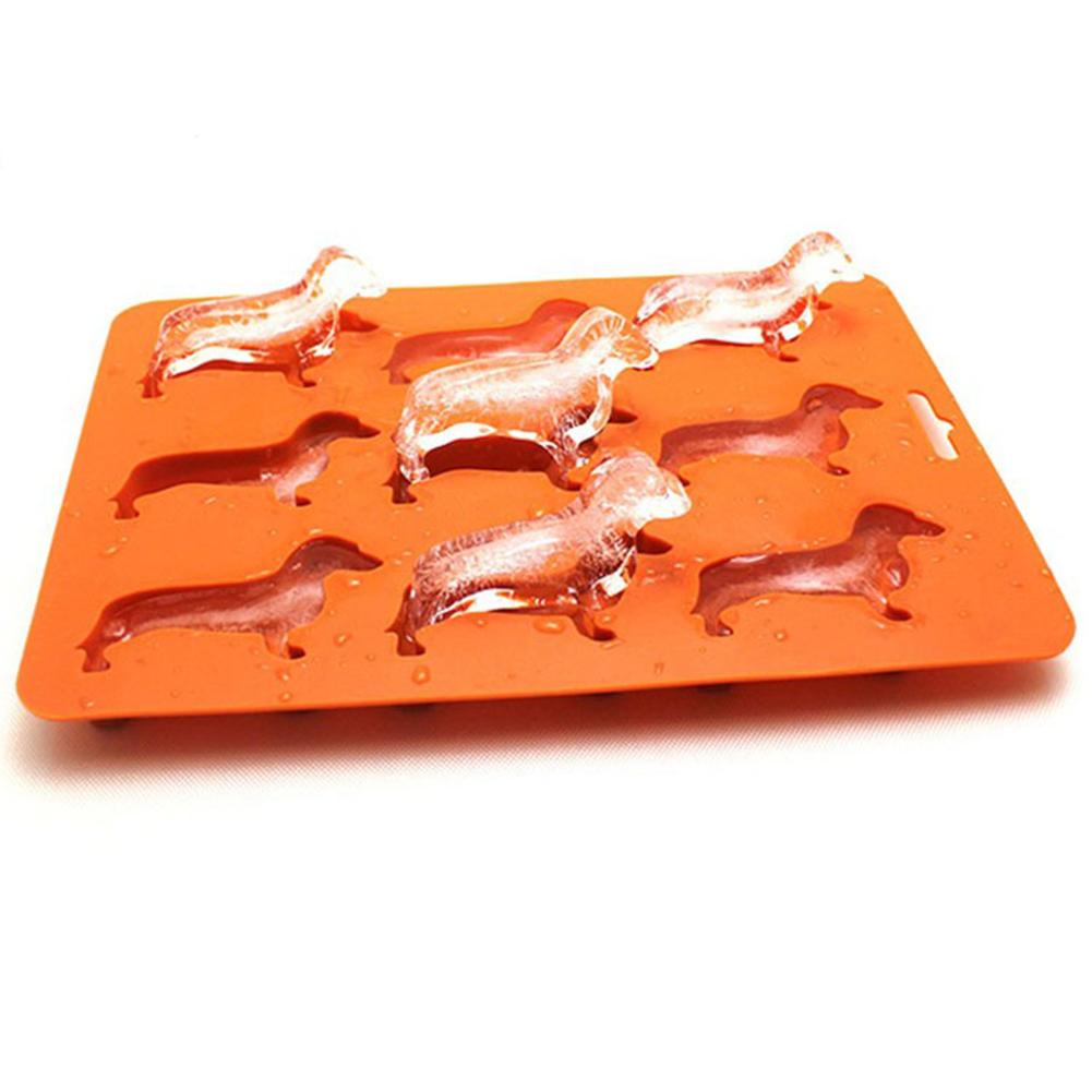 Dachshund Ice Tray. Ice Popping off the tray shaped like dachshund.